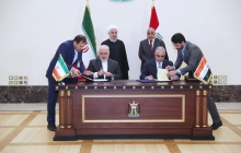 Signing pacts between Iran and Iraq