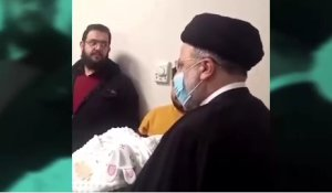 اذان‌گفتن آیت‌الله رئیسی در گوش نوزاد فردیسی

