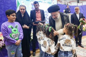 Celebration of handing over land and housing