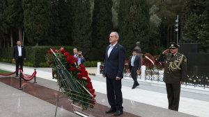 Iran president pays tribute to Heydar Aliyev, January 20 martyrs
