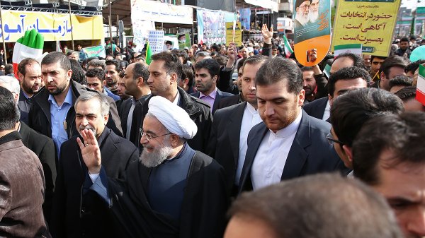 President joins revolution anniversary demonstrators