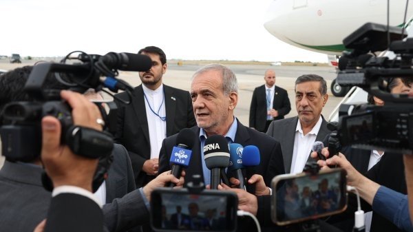 Iran president says conveys message of peace, security to world